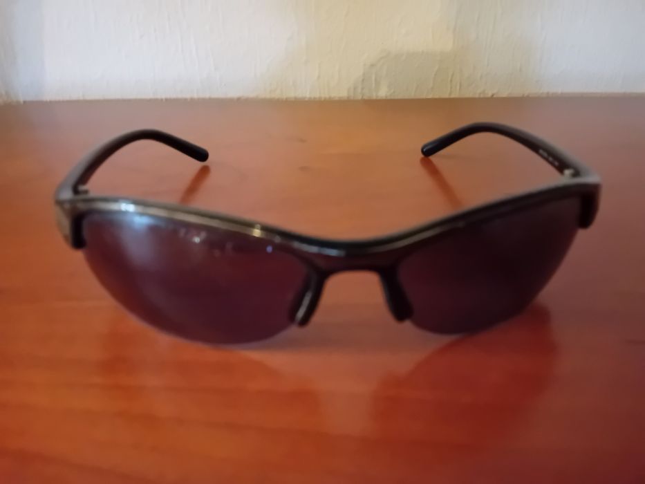 Óculos escuros Prada