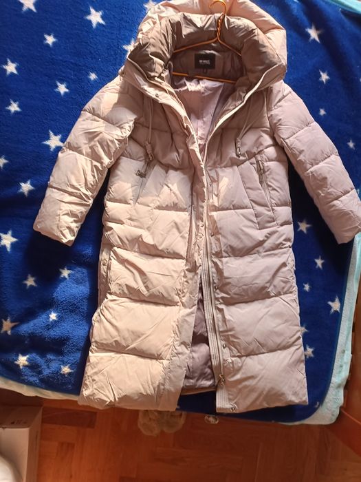 Продам пуховик женский новый