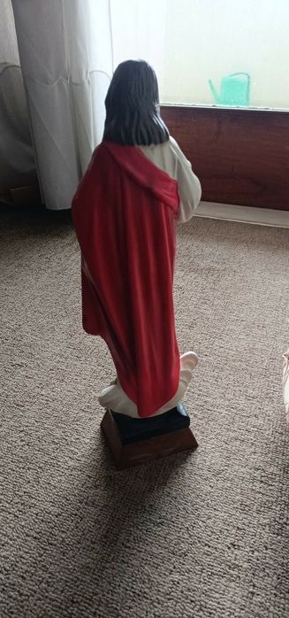 Imagem coração segurado Jesus" olhos em vidro"