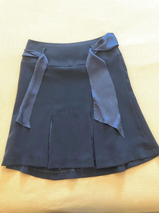 Saia Caroll em muito bom estado