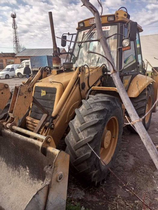 Экскаватор  погрузчик JCB 4