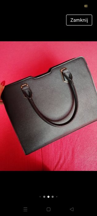 Duża czarna elegancka torebka do biura solidnie wykonana mieści A4