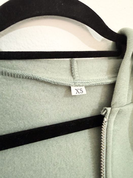 Casaco com fecho zip