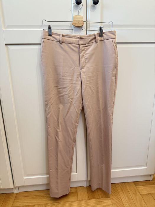 Beżowe spodnie garniturowe Mango 36