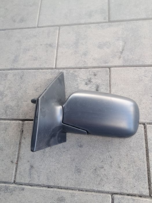 Lusterko zewnętrzne manualne lewe kierowcy Toyota Yaris rok 2001