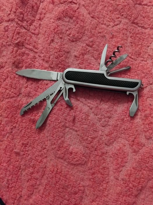 Продам ножик мультитул