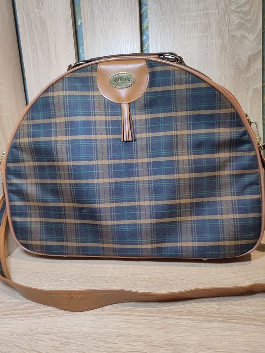 Дорожная сумка в клеточку бренда Stentor