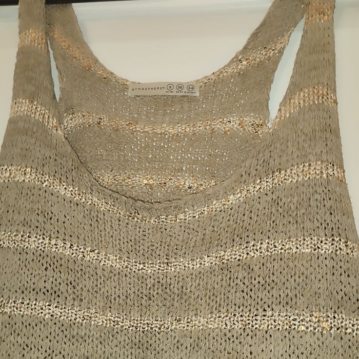 Złota kamizelka sweterkow a Atmosphere