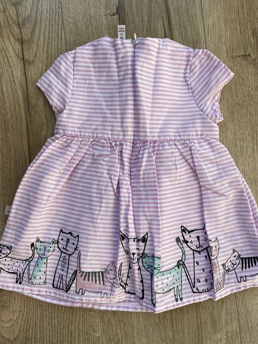 Nowa elegancka sukienka coccodrillo w paski z kotkami