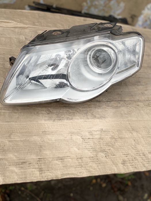 Фара ліва Passat b6