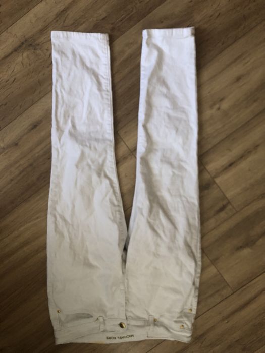 Białe spodnie jeansowe damskie Michael Kors 8/29