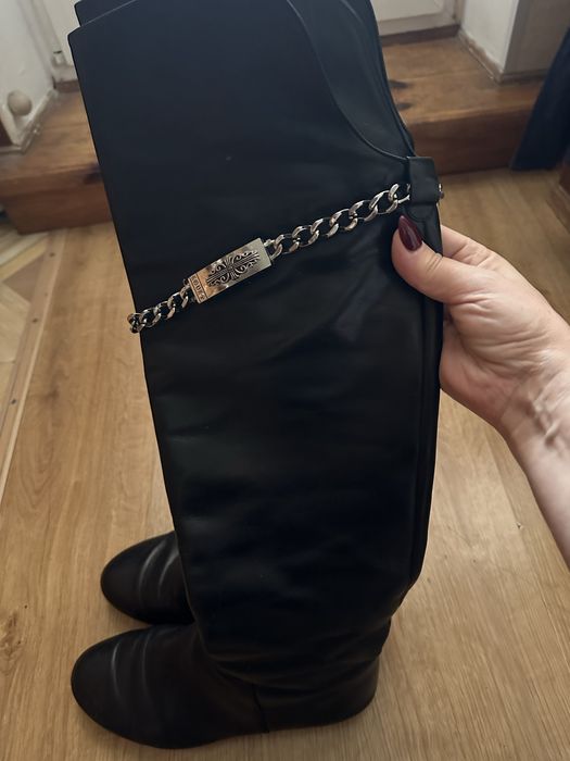 Фірмові високі шкіряні чоботи