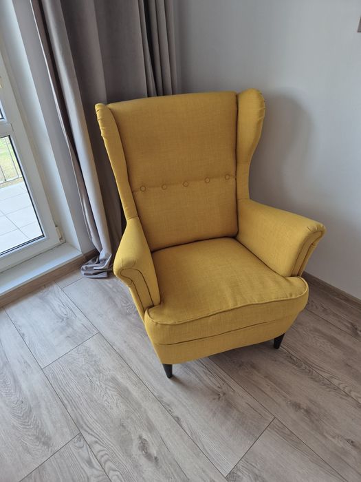 Fotel uszak Strandmon żółty IKEA jak nowy