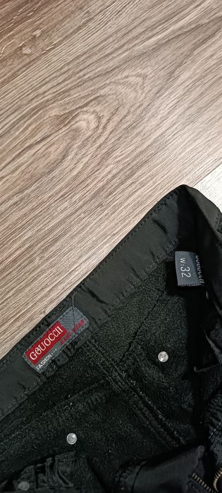 Пальто-пуховик фірмовий на 9-10років, джинси чорні теплі