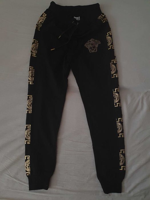 Nowe damskie spodnie dresowe Versace L 40 czarne ze złotym meduza