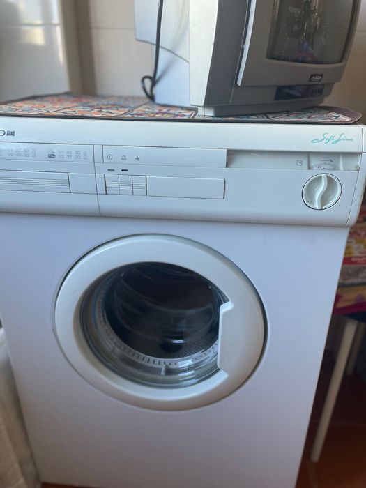 Máquina de secar roupa