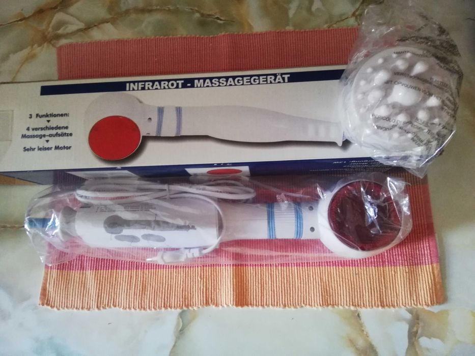 Massajador com infravermelhos. Por estrear, ainda embalado - 25 euros.