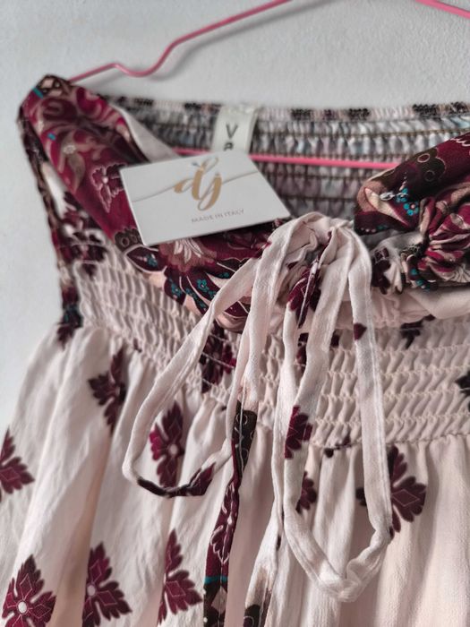 Macacão novo com etiqueta