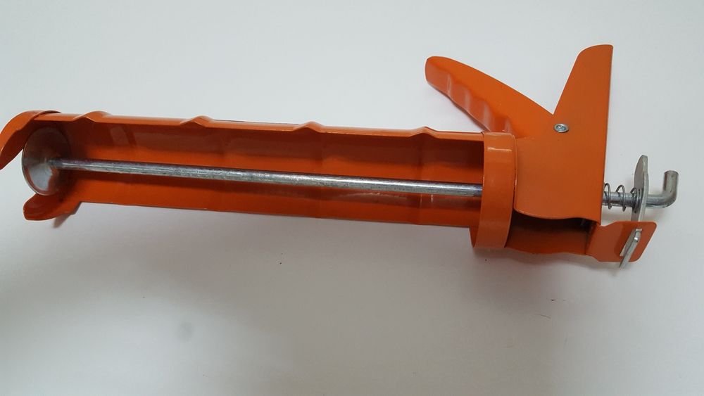 Pistola de pôr silicone