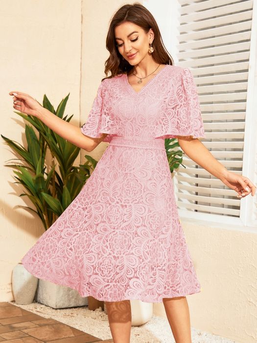 Sukienka koronkowa rozkloszowana dekolt v mini różowa M 38