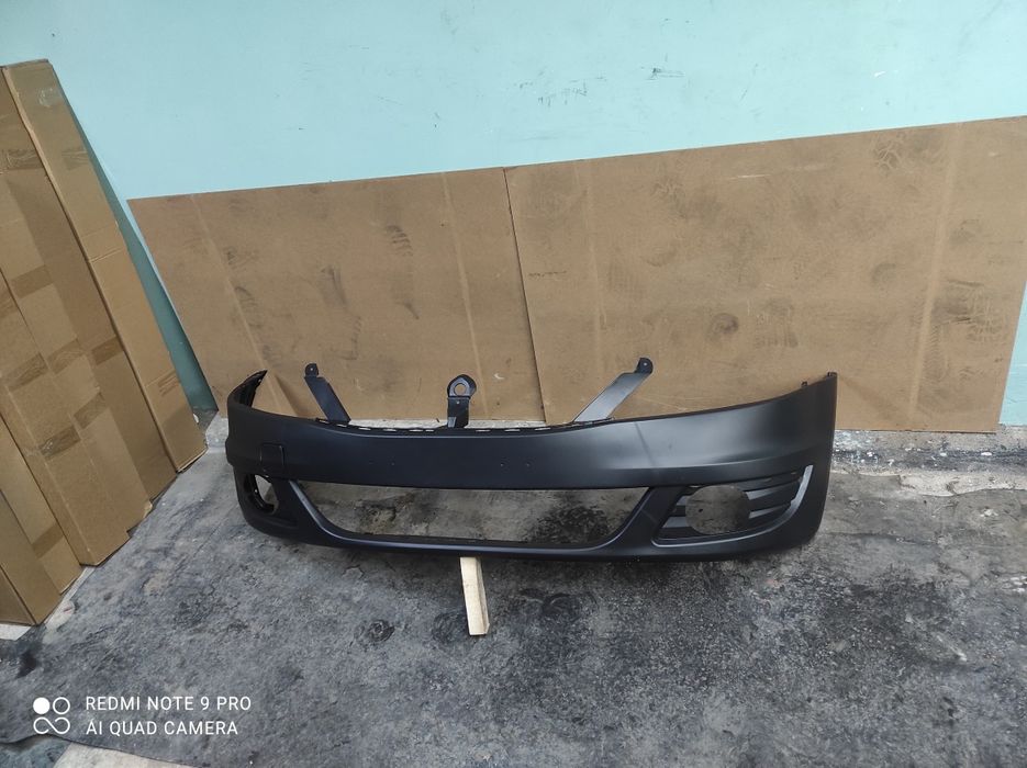 Бампер передній Dacia Logan логан