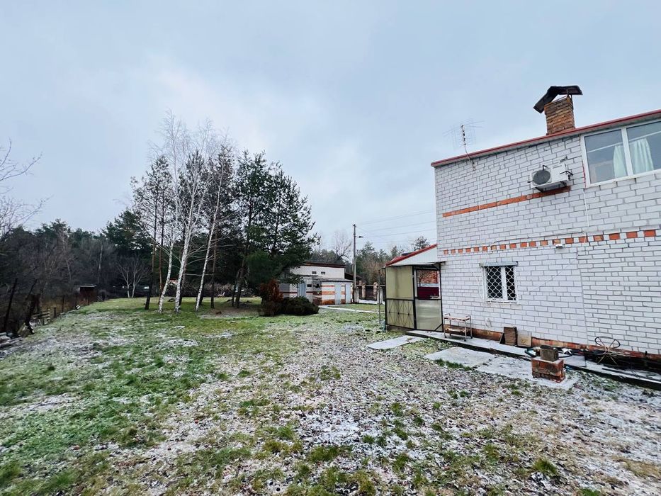 Продам участок в Обуховке,сосновый лес,река пляж закрытая территория