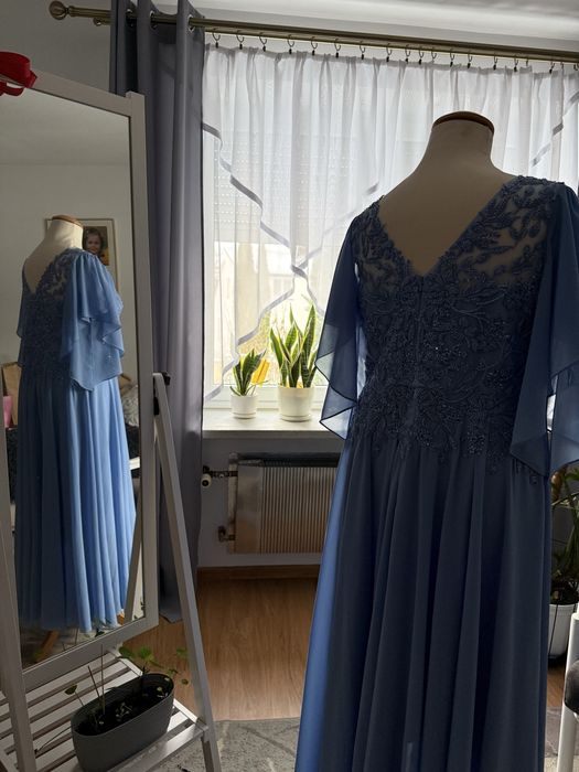 Niebieska sukienka rozmiar 50