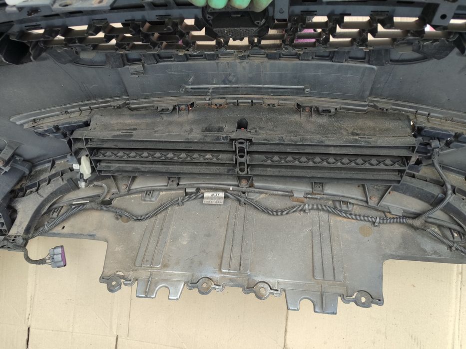 Бампер Opel Astra J передній