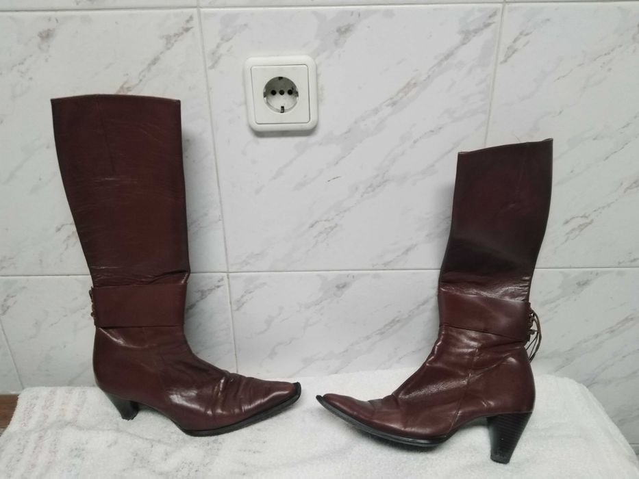 Botas cano alto pele