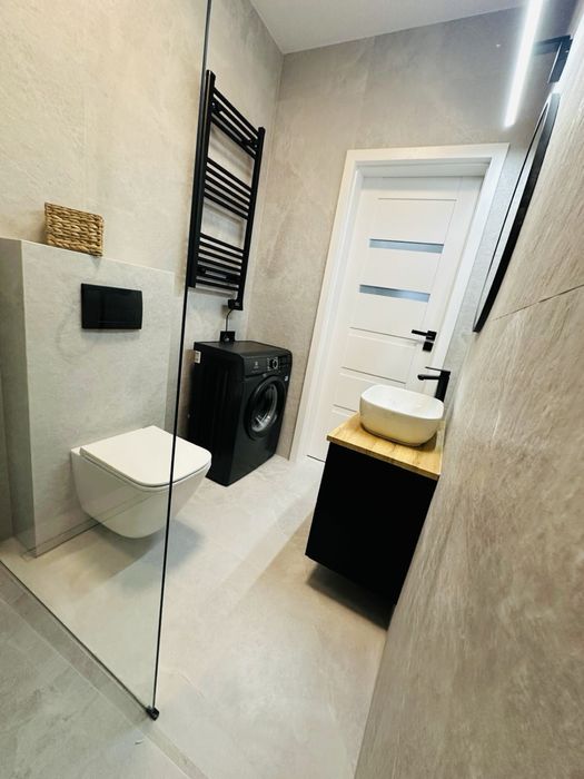 Nowe dwupoziomowe mieszkanie   z patio i ogrodem