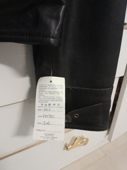 Casaco novo em pele.