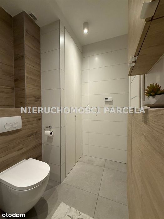 Mieszkanie w apartamentowcu z ogródkiem