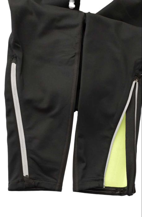 Spodnie NEW BALANCE Windblocker, R. XS/S