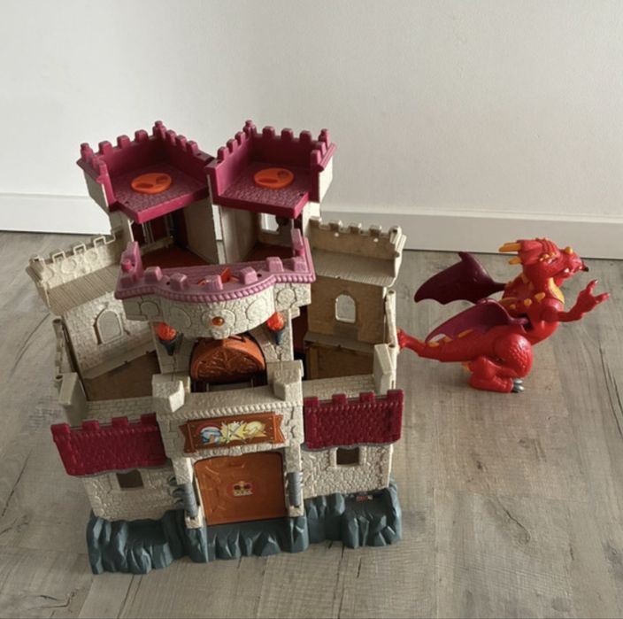 Interaktywny zamek ze smokiem Fisher Price