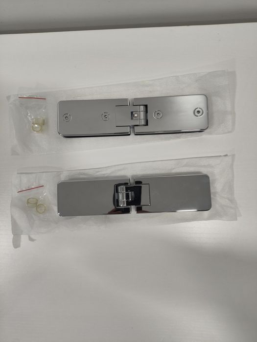 Par de dobradiças para portas de duche de batente 180°.