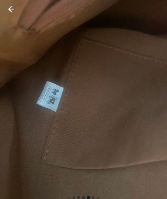 Mochila Coach castanha