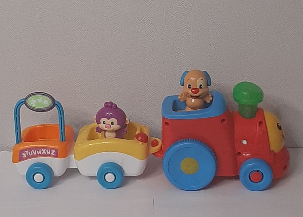 Развивающая игрушка "Поезд умного щенка" от бренда  Fisher Price
