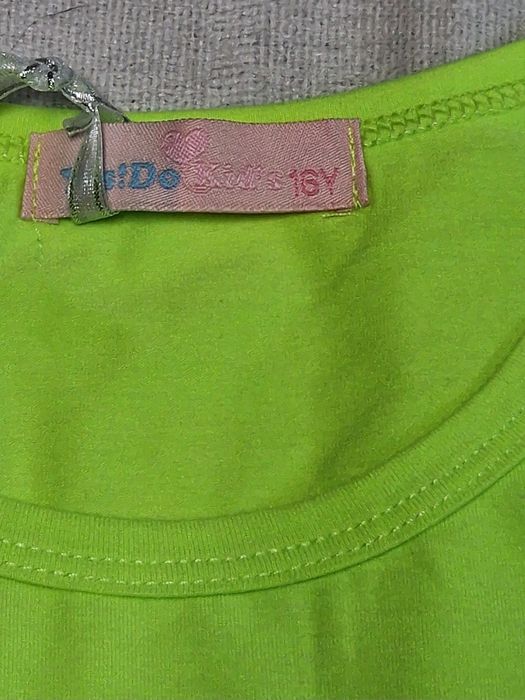 Conjunto de camisola e calção para menina. Tamanho 16 anos