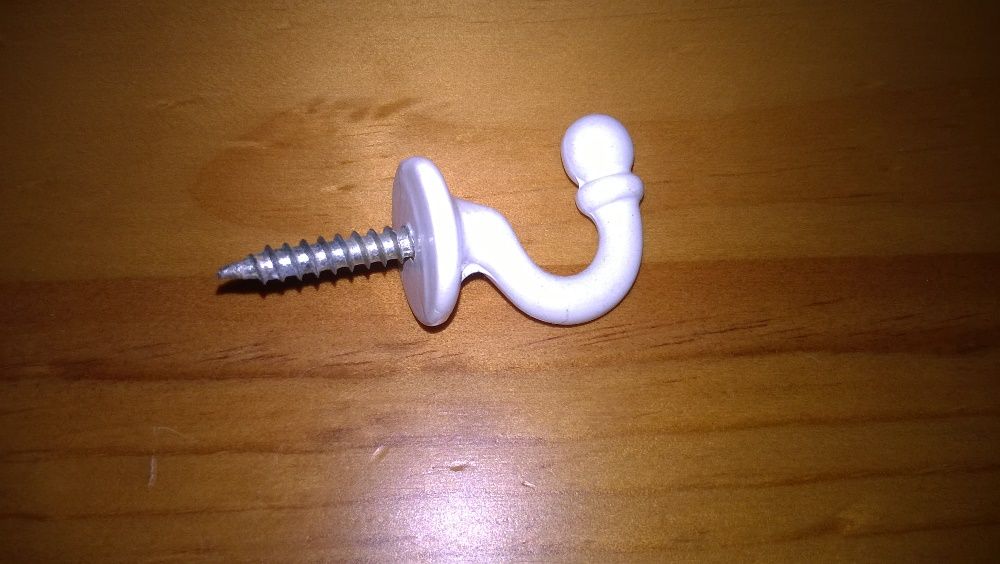 Fixadores de parede em esmalte para cabides