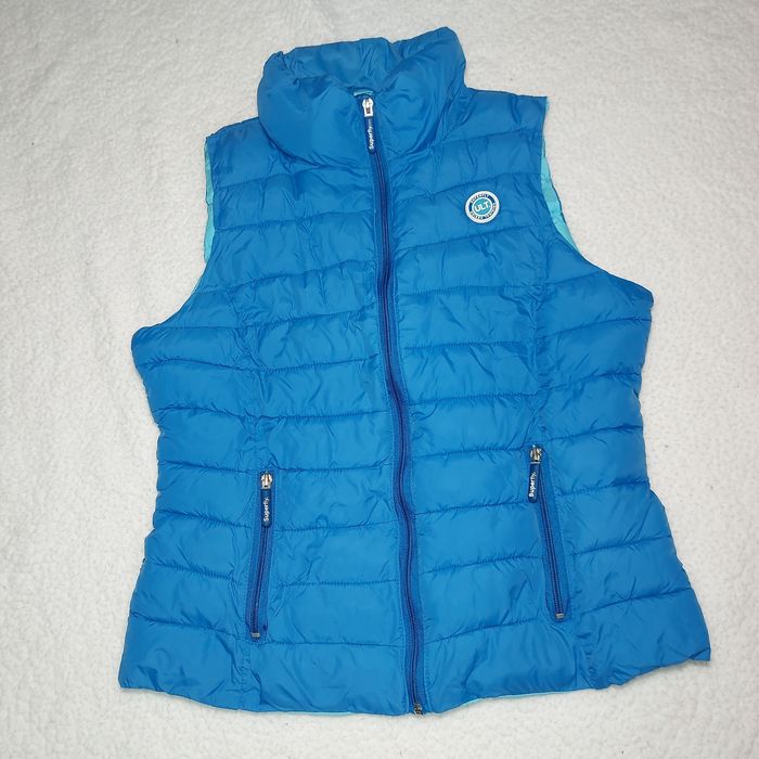 Жилетка на пуху,теплая