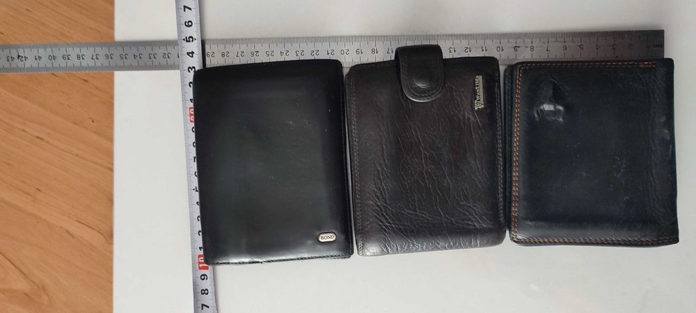 Шкіряні  портмоне,  гаманці, бумажники