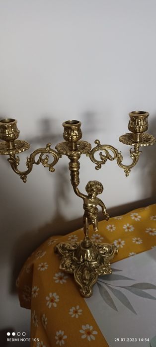 Świecznik 2-ramienny na 3 świece.