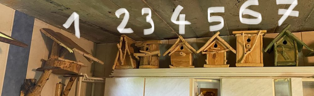 Budki lęgowe dla ptaków, ręcznie wykonane z pnia debowego.