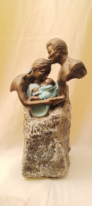 Estatueta pais com bebé