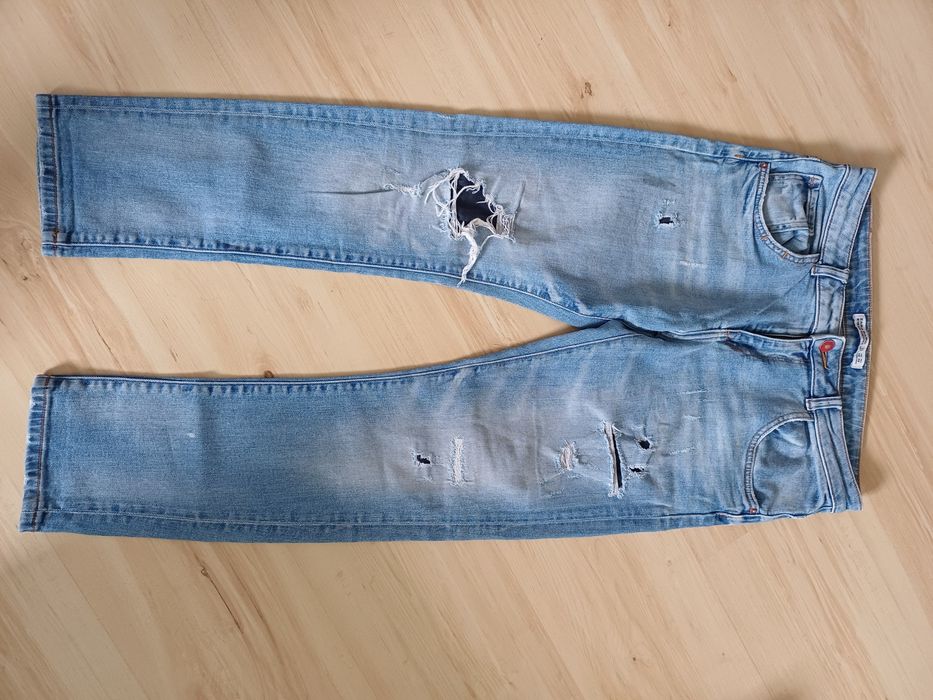 Świetne spodnie dżinsowe Zara 1975 r. 38