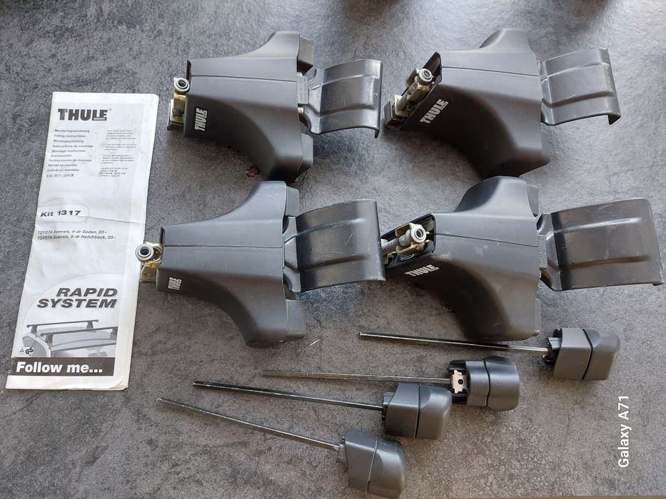 Stopy Thule 753 + adapter kit 1317 Toyota Avensis T25 03-09