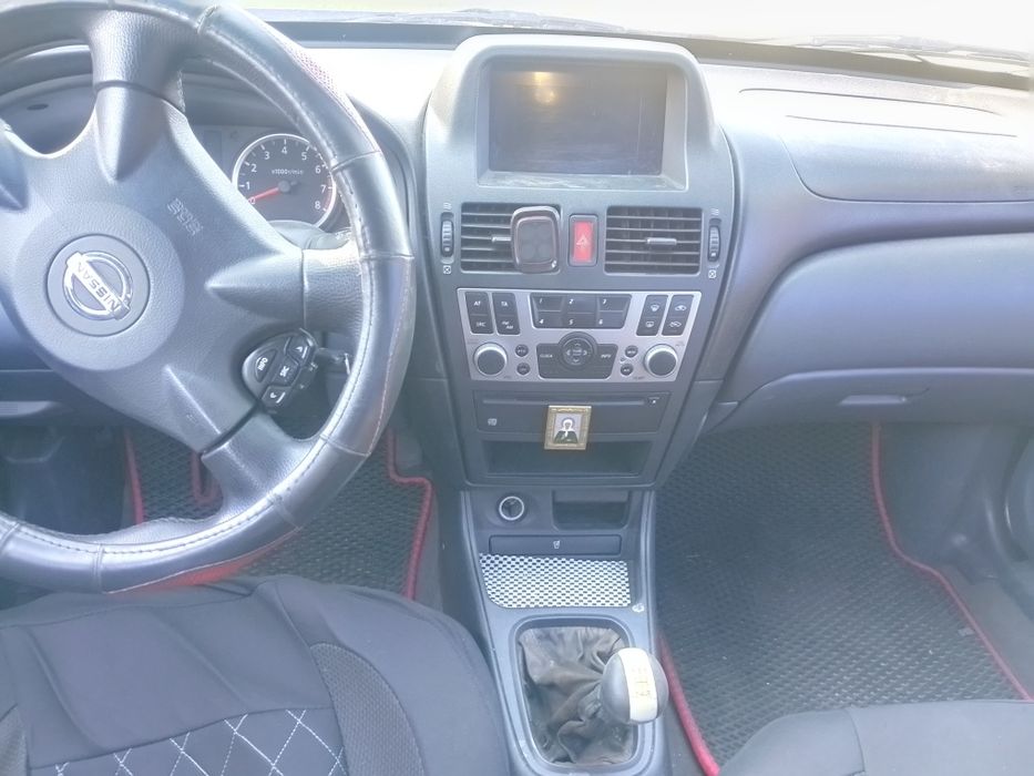 nissan almera 2005 року