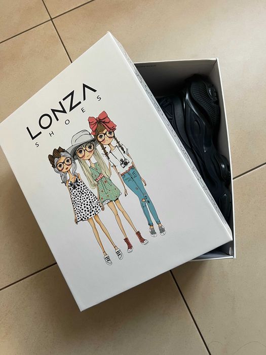 Кросівки підліткові