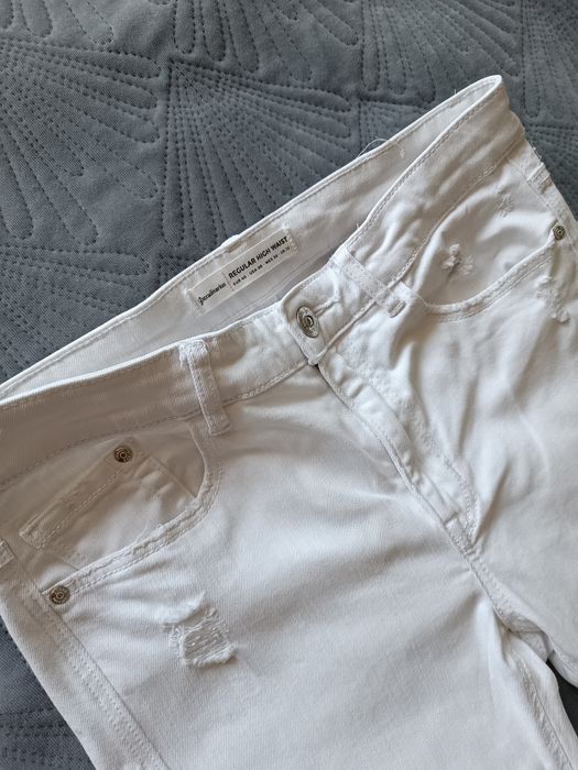 Spodnie dżinsy białe Stradivarius 40L