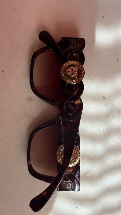 Oculos novos  versage o